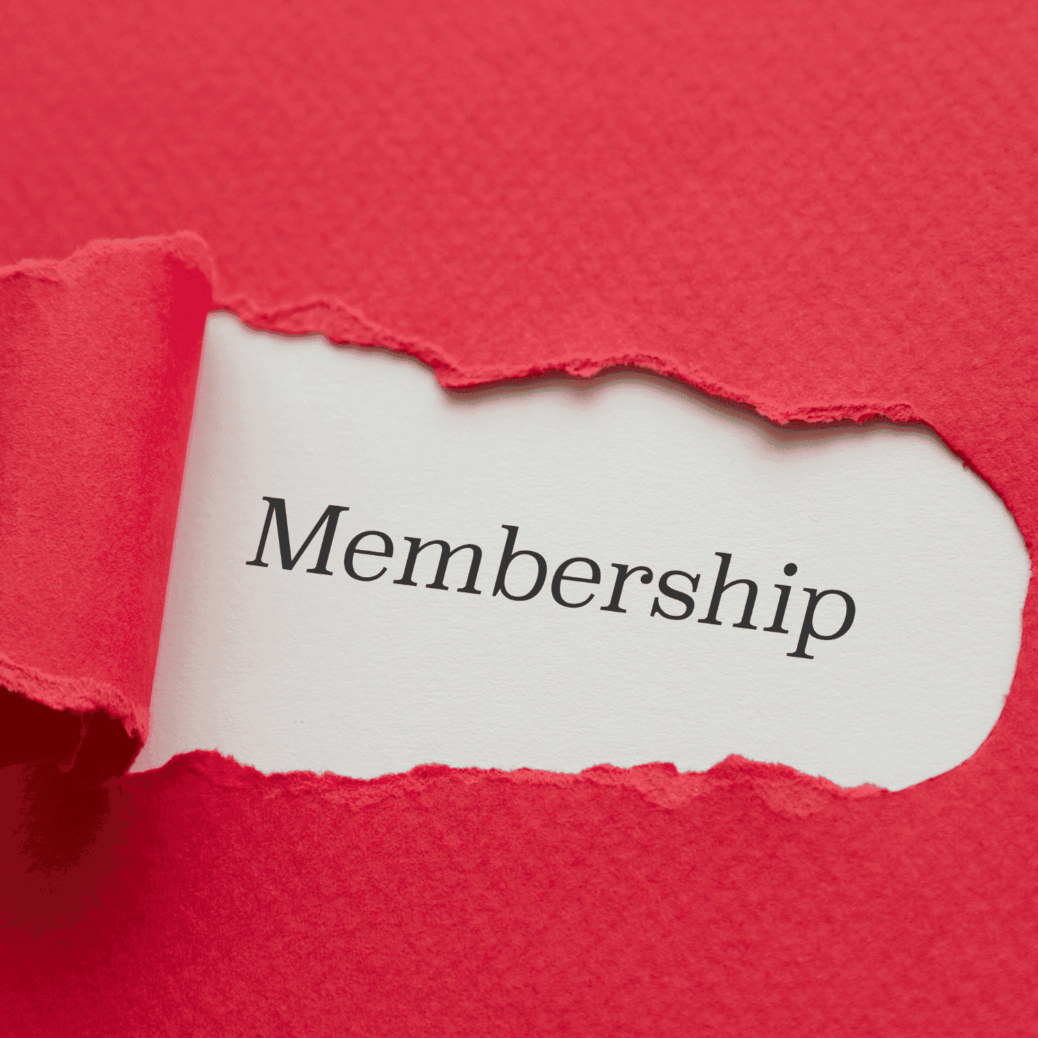 Torn red paper revealing the word "Membership" underneath.